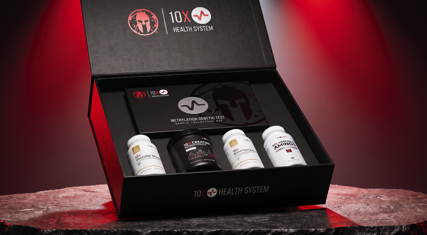 10X Health System kit opened, showing genetic test and supplement bottles